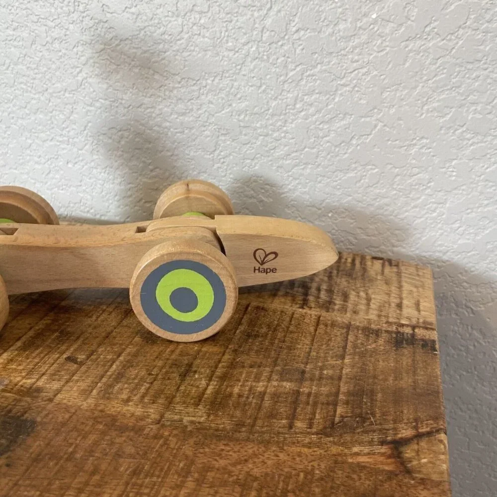 Hape Wooden Walk Along Pull Toy Snail Worm Wobbly Eyes Wheels Kids